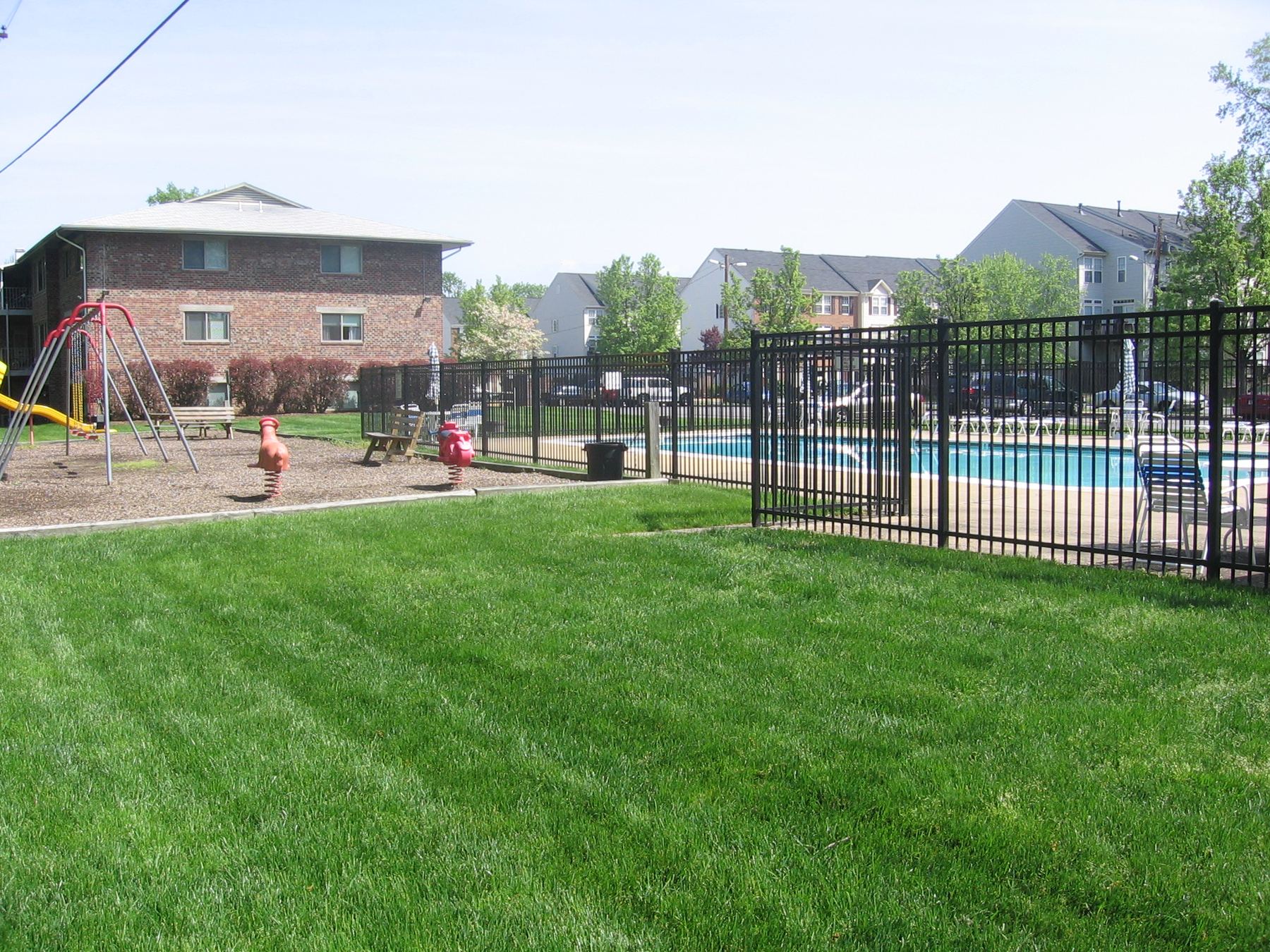 Skyview playground on a green lawn