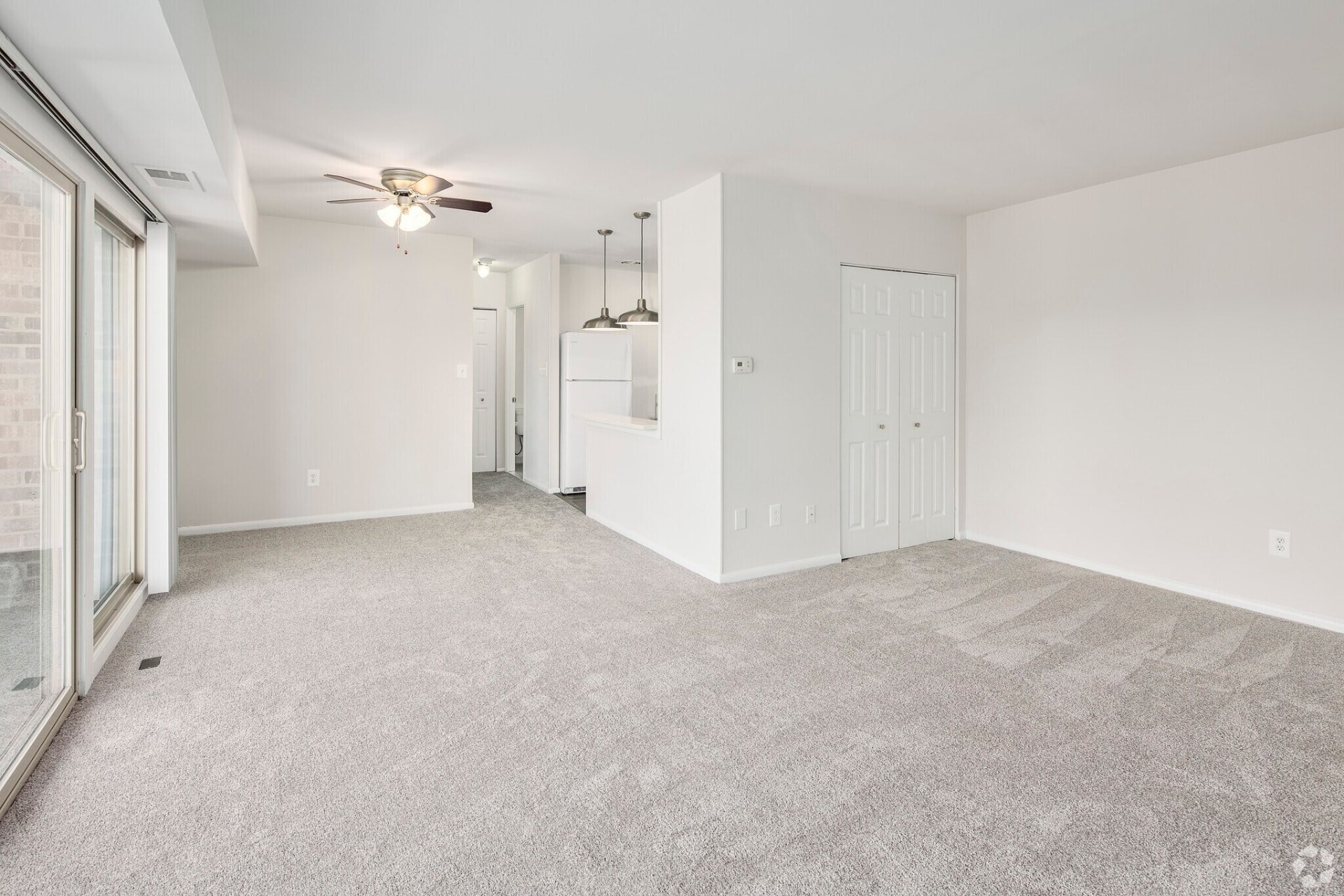 One-bedroom living room looking toward the dining area